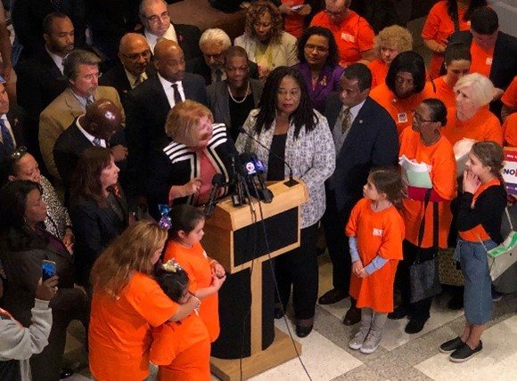 Daphne Campbell speaking at a Capitol press conference alongside advocates
